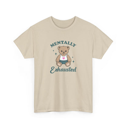 Front view of a beige T-shirt featuring a teddy bear graphic with the text "Mentally Exhausted." Part of the Vivid Divergence Sensory Friendly Unisex Tees Range.