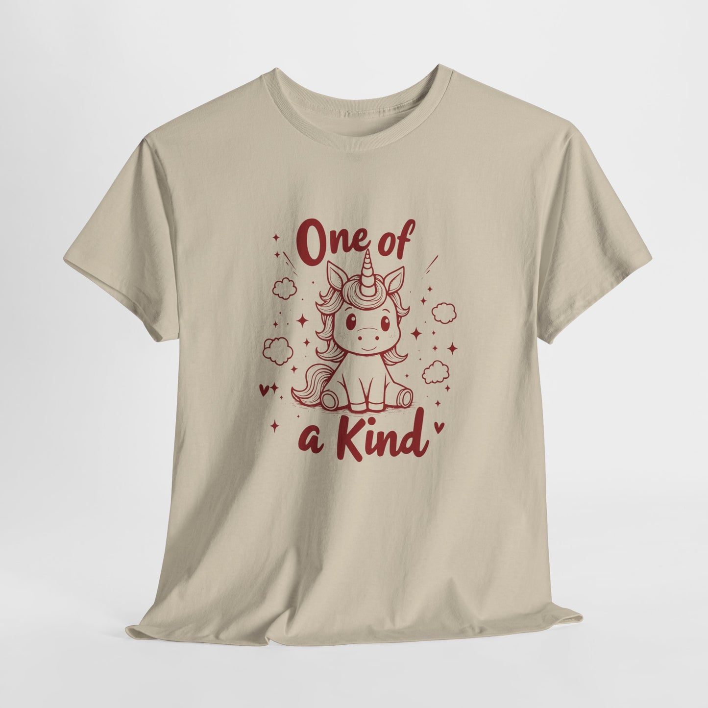 Hanging view of a beige T-shirt with "One of a Kind" text and a doodle-style unicorn surrounded by hearts and sparkles. Part of the Vivid Divergence Sensory Friendly Unisex Tees Range.