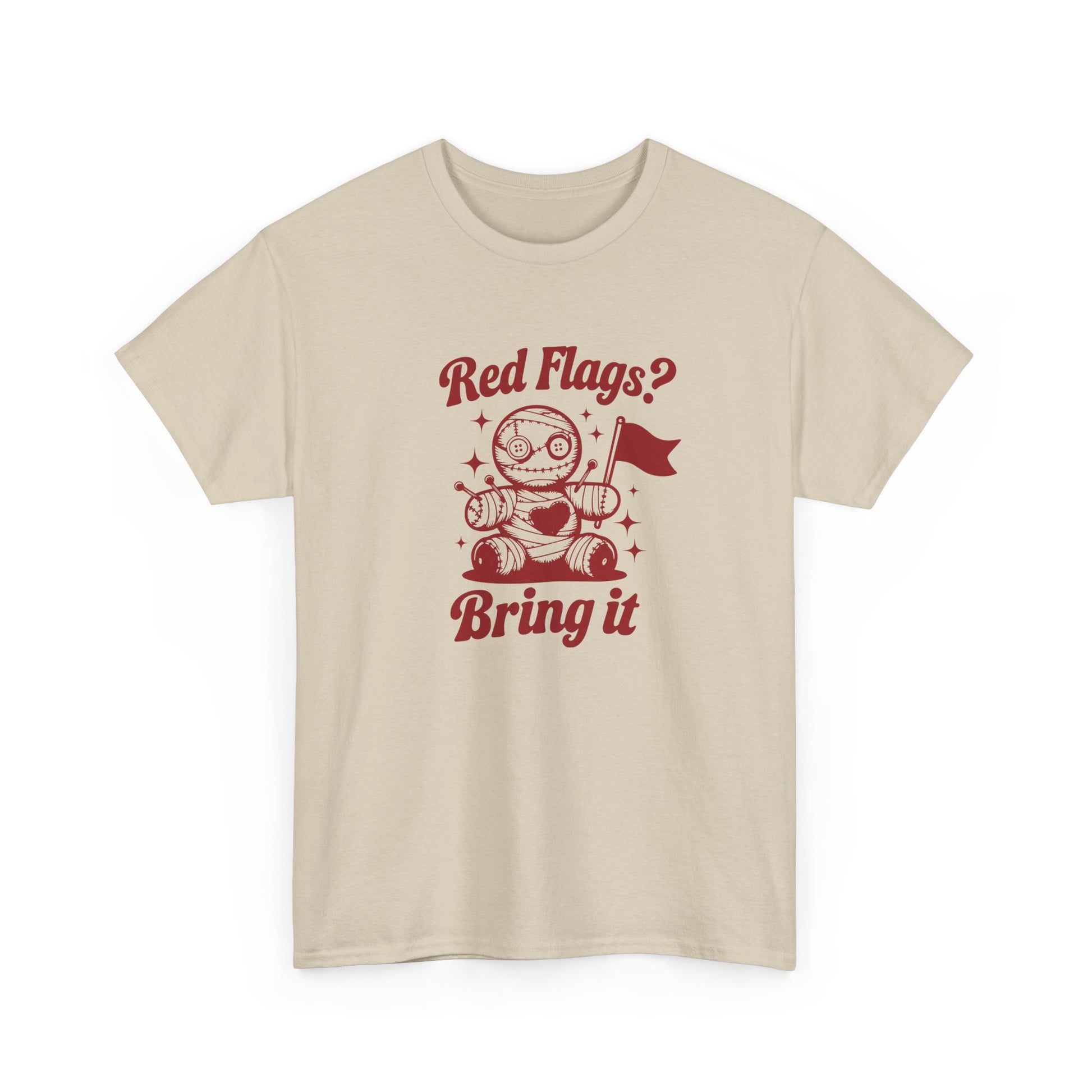 Front view of a beige T-shirt with "Red Flags? Bring It" text and a cute voodoo doll holding a red flag surrounded by sparkles. Part of the Vivid Divergence Sensory Friendly Unisex Tees Range.