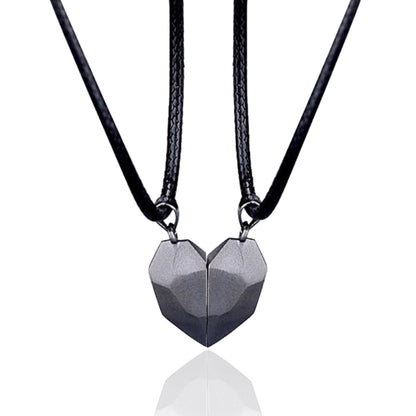 Two black cord necklaces forming a complete silver heart, a thoughtful necklace for a couple or best bff necklaces.