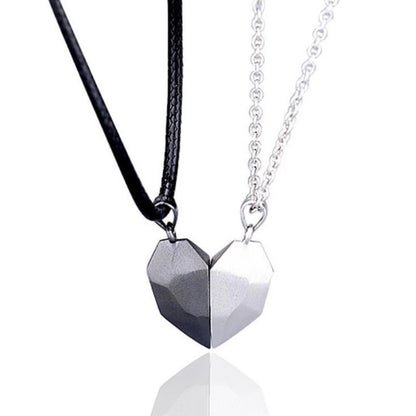 Two black cord necklaces forming a complete silver heart, a thoughtful necklace for a couple or best bff necklaces.