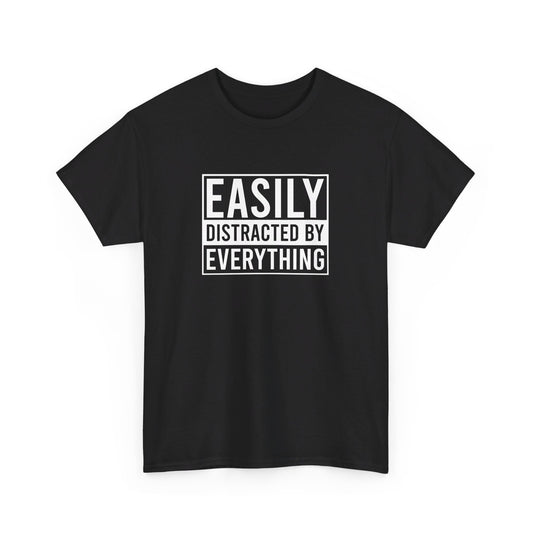 Front view of a black T-shirt with the text "Easily Distracted by Everything" in bold white letters. Part of the Vivid Divergence Sensory Friendly Unisex Tees Range.