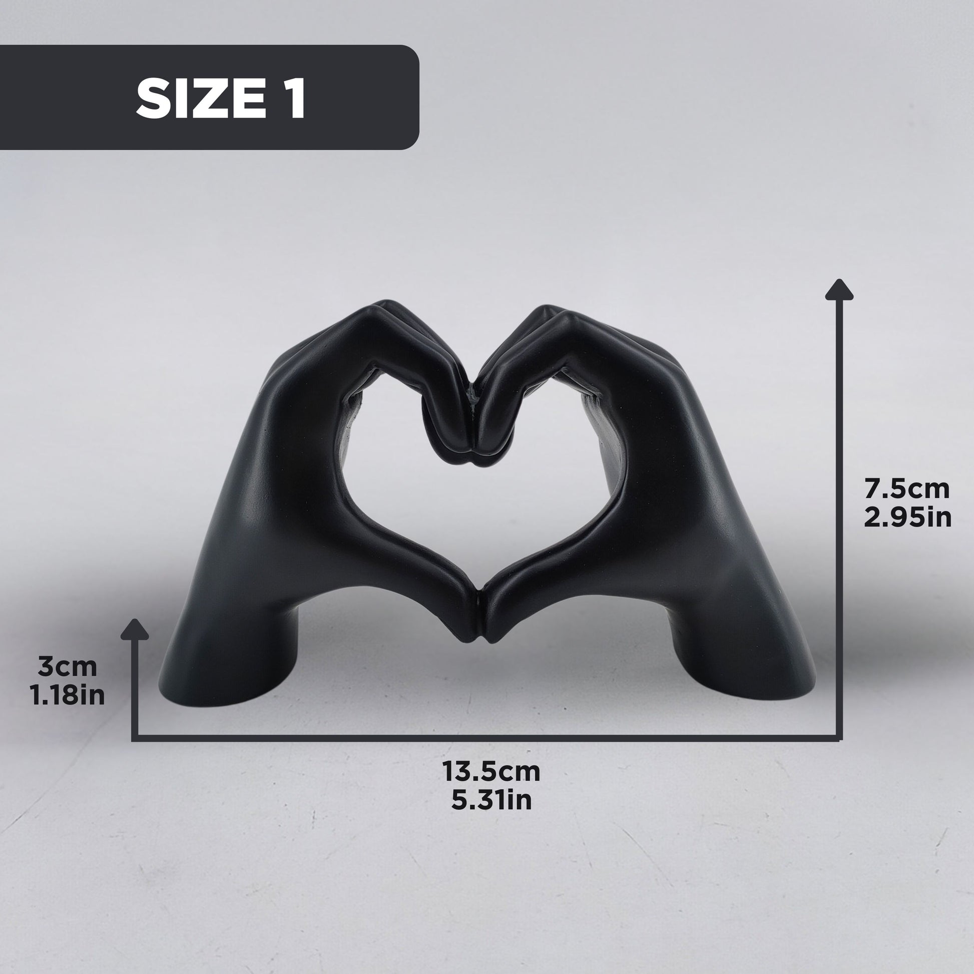 Black hand-shaped sculpture forming a heart with dimensions of 7.5 cm height, 13.5 cm width, and 3 cm depth for Size 1 selection. Stylish dopamine decor and a perfect gift for Valentine's Day.