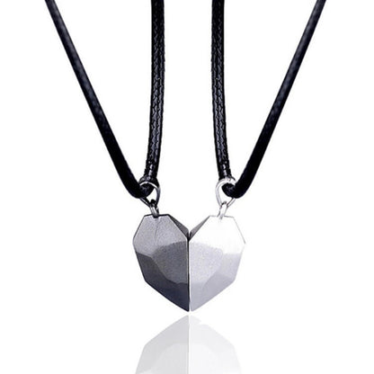 Black and silver necklaces forming a split heart, ideal as cool friendship necklaces or best friend necklaces.