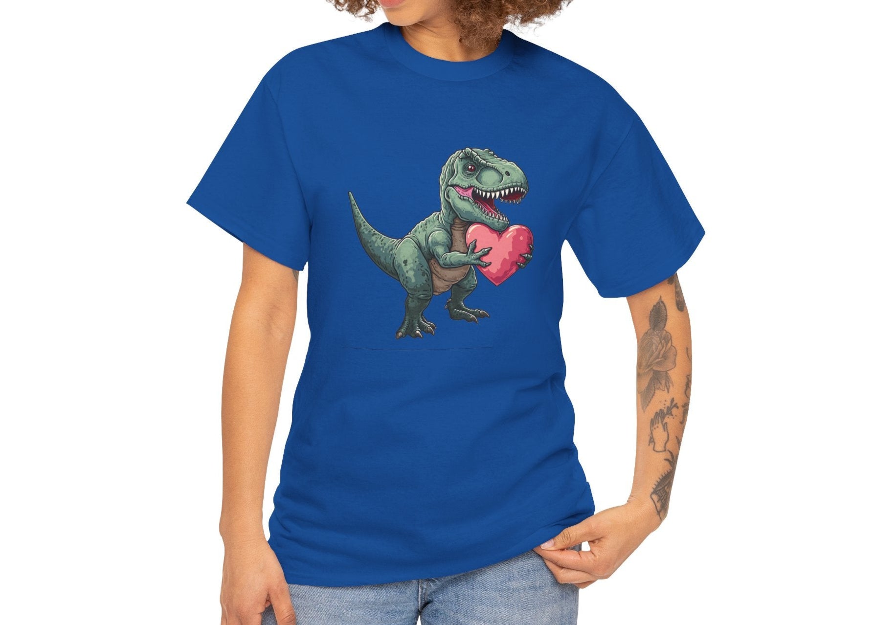 Modeled view of a blue T-shirt with a playful T-Rex holding a pink heart. Part of the Vivid Divergence Sensory Friendly Unisex Tees Range.