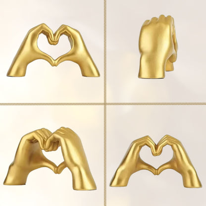 Multiple views of a gold hand-shaped sculpture forming a heart showing 4 different angles, against a light background. A versatile piece of dopamine decor and a perfect Valentine's Day gift.