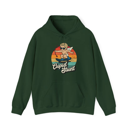 Front view of a green hoodie with a vintage sunset design featuring Cupid riding a skateboard and "Cupid Stunt" text. Exclusive release for Valentine's Day. Part of the Vivid Divergence Sensory Friendly Sweaters Range.