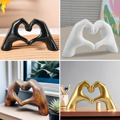 Four hand-shaped sculptures forming a heart in black, white, gold, and wood finishes, displayed on various surfaces. Stylish dopamine decor and perfect gifts for Valentine's Day.