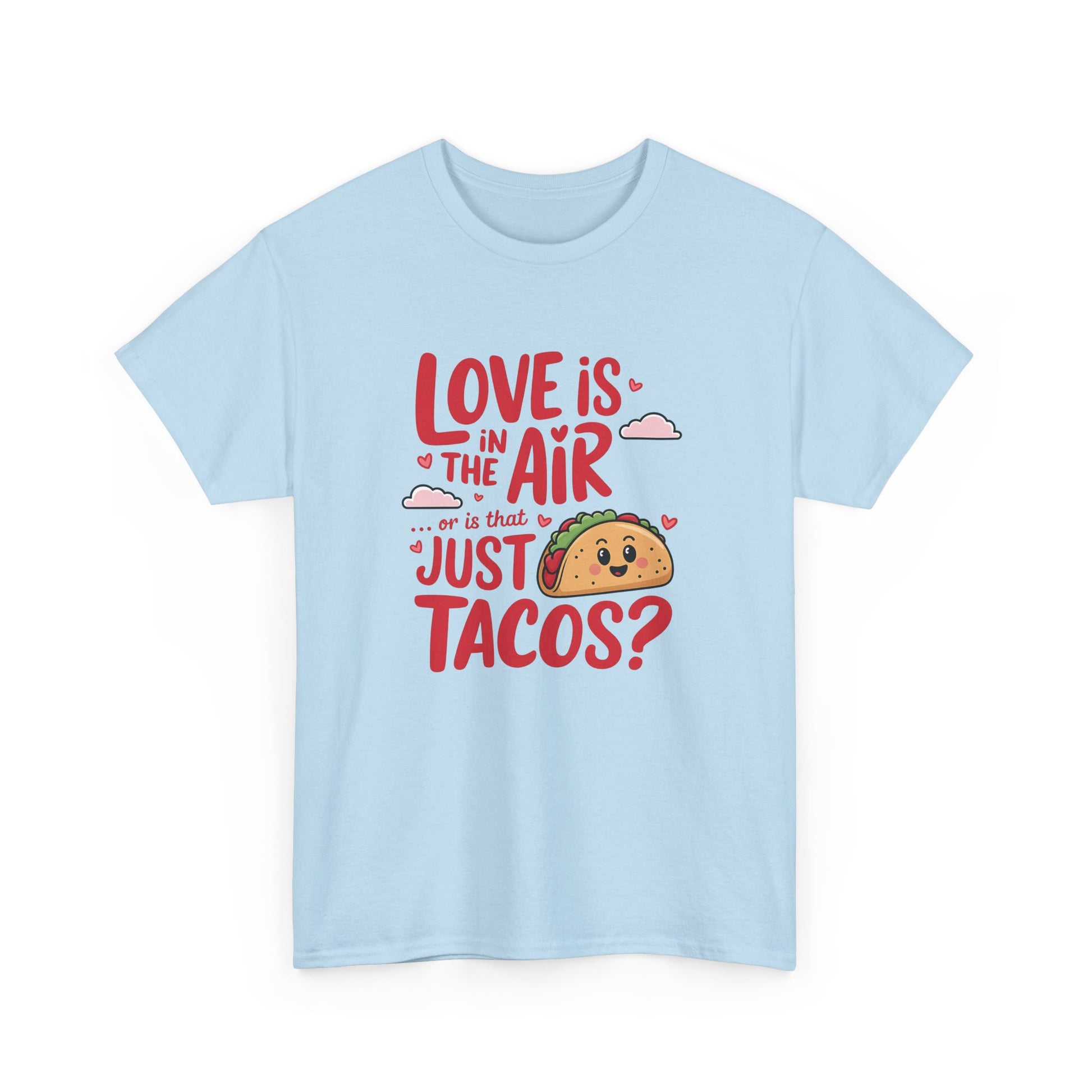 Front view of a light blue T-shirt featuring red and black text with a taco illustration that reads "Love Is In The Air Or Is It Just Tacos?" Exclusive release for Valentine’s Day. Part of the Vivid Divergence Sensory Friendly Unisex Tees Range.