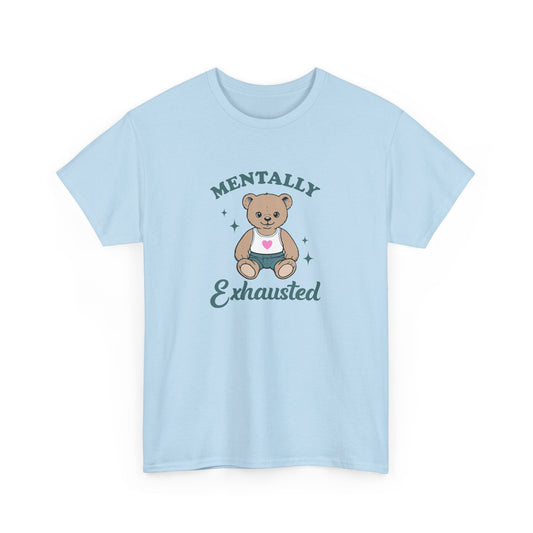 Front view of a light blue T-shirt featuring a teddy bear graphic with the text "Mentally Exhausted." Part of the Vivid Divergence Sensory Friendly Unisex Tees Range.