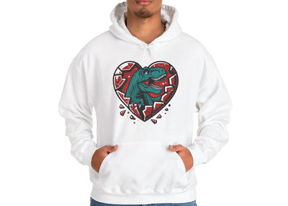 Model wearing a white hoodie with a shattered heart design featuring a T-Rex emerging from the center in vibrant teal and red tones. Exclusive release for Valentine's Day. Part of the Vivid Divergence Sensory Friendly Sweaters Range.