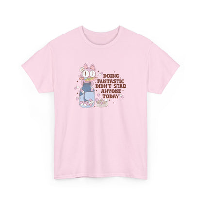 Front view of a pink T-shirt with a cartoon character and the text "Doing Fantastic, Didn't Stab Anyone Today." Part of the Vivid Divergence Sensory Friendly Unisex Tees Range.