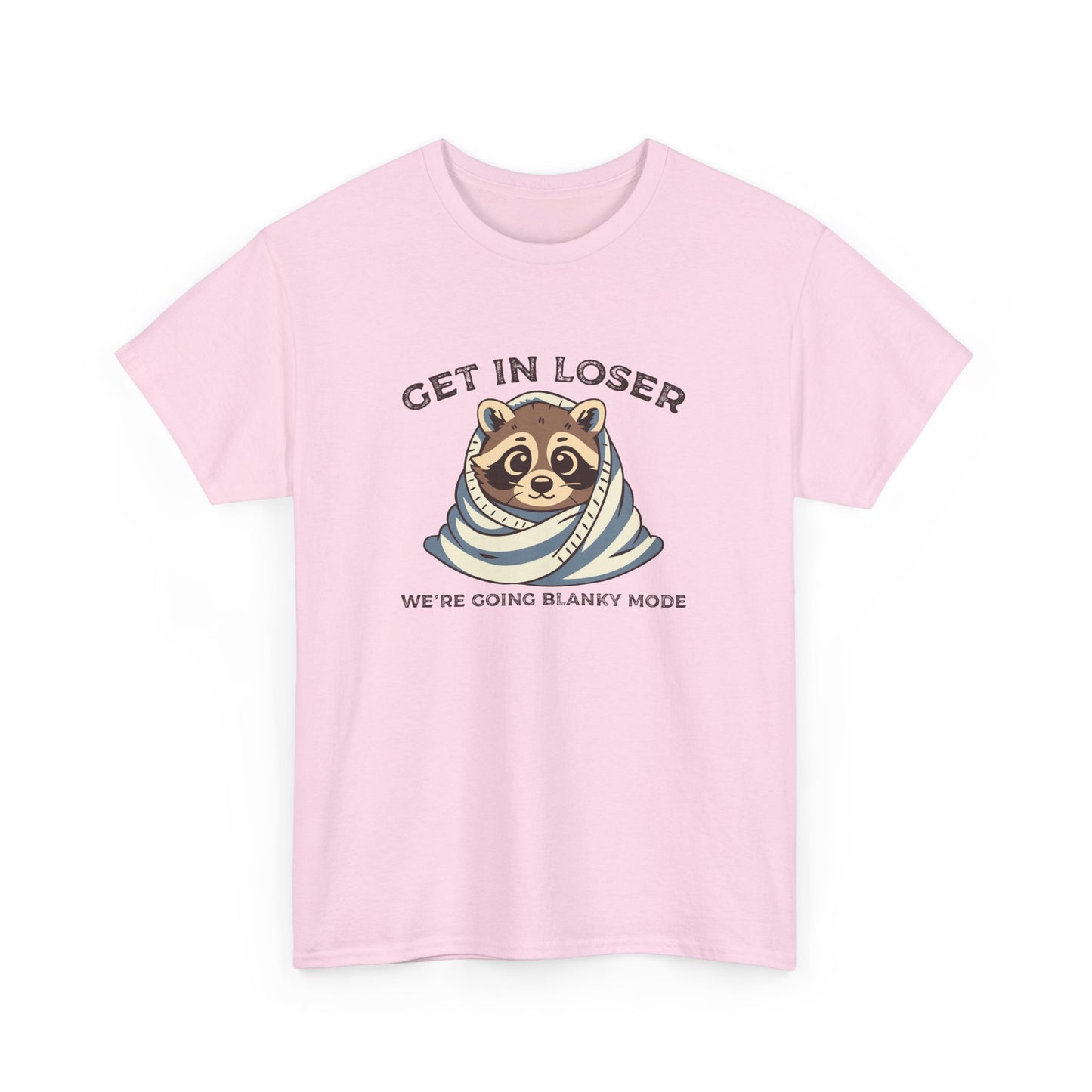 Hanging front view of a pink T-shirt featuring a cute raccoon wrapped in a blanket with text that reads "Get In Loser, We're Going Blanky Mode." Part of the Vivid Divergence Sensory Friendly Unisex Tees Range.