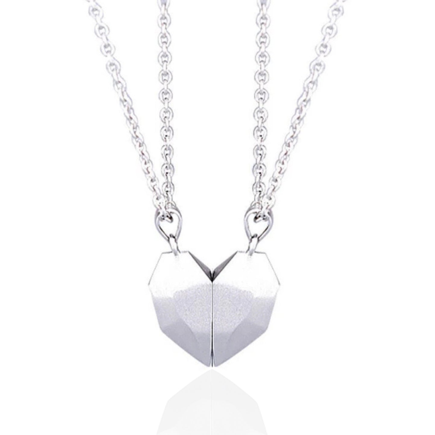 Matching silver necklaces with heart pendants, perfect as best friend necklaces or a couples necklace.