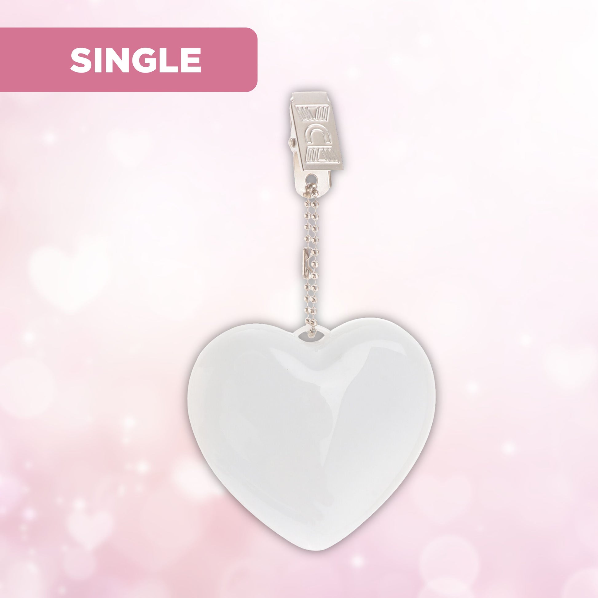 Heart-shaped LED bag clip on a pink background with "Single" label, showcasing its touch-activated and battery-powered features.