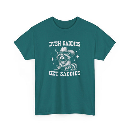 Front view of a teal T-shirt with the text "Even Baddies Get Saddies" and a graphic of a crying eye. Part of the Vivid Divergence Sensory Friendly Unisex Tees Range.