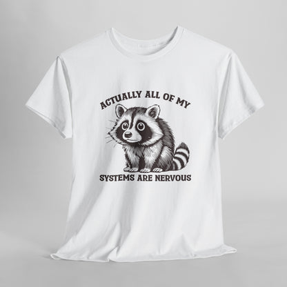 Front hanging view of a white T-shirt with "Actually All Of My Systems Are Nervous" text and a raccoon graphic. Part of the Vivid Divergence Sensory Friendly Unisex Tees Range.