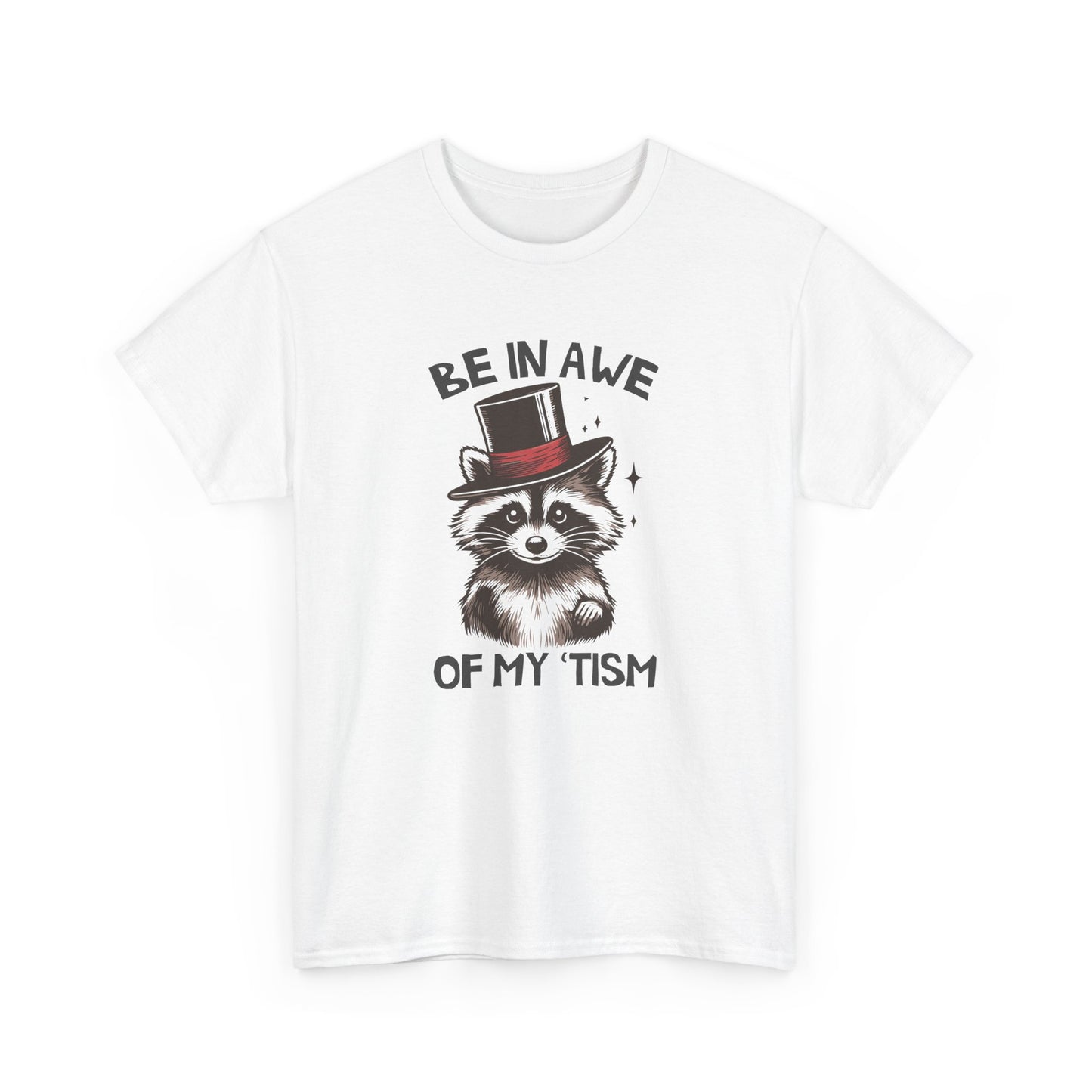 Front view of a white T-shirt featuring a raccoon wearing a top hat with the text "Be In Awe Of My Tism." Part of the Vivid Divergence Sensory Friendly Unisex Tees Range.