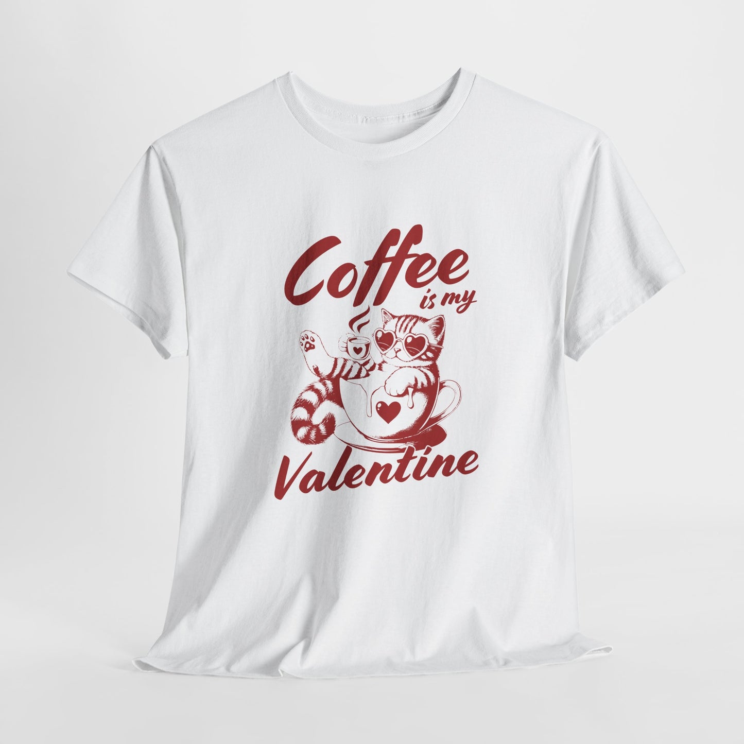 Hanging white T-shirt with red text and cat illustration holding a coffee cup that reads "Coffee Is My Valentine." Exclusive release for Valentine’s Day. Part of the Vivid Divergence Sensory Friendly Unisex Tees Range.