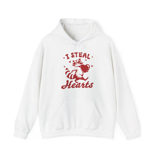 Front view of a white hoodie with "I Steal Hearts" text and a cute red Cupid design holding a bow and arrow. Exclusive release for Valentine's Day. Part of the Vivid Divergence Sensory Friendly Sweaters Range.