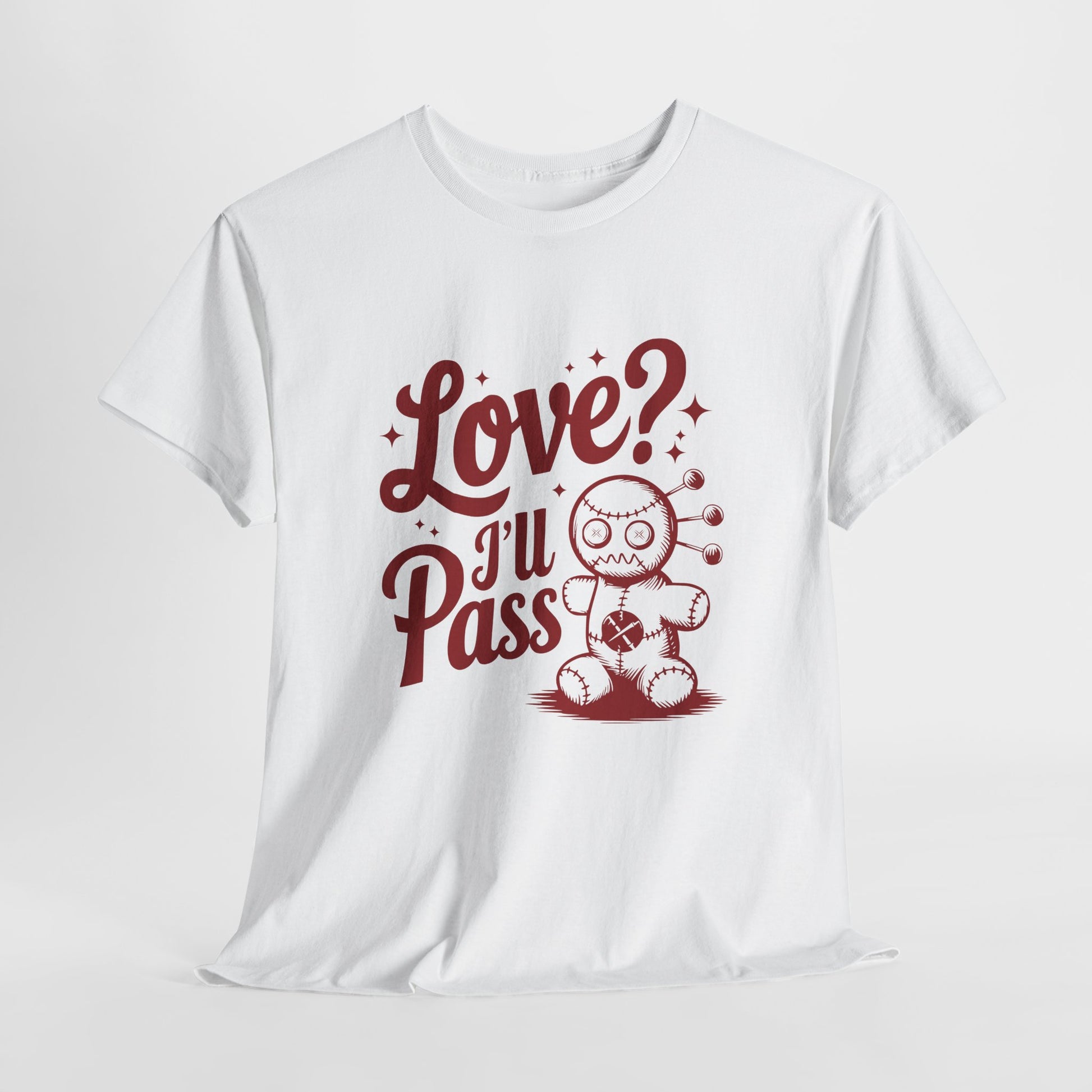 Hanging white T-shirt with red text and a cartoon coffee cup illustration that reads "Love? I’ll Pass." Exclusive release for Valentine’s Day. Part of the Vivid Divergence Sensory Friendly Unisex Tees Range.