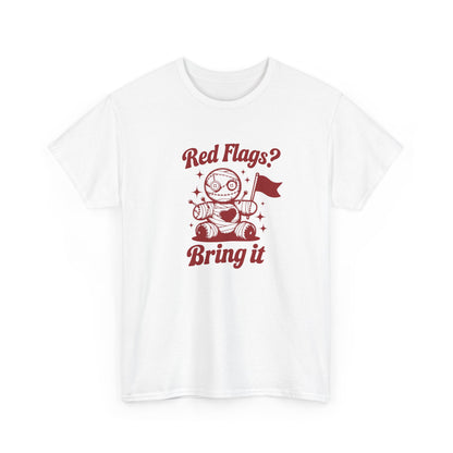 Front view of a white T-shirt with "Red Flags? Bring It" text and a cute voodoo doll holding a red flag surrounded by sparkles. Part of the Vivid Divergence Sensory Friendly Unisex Tees Range.