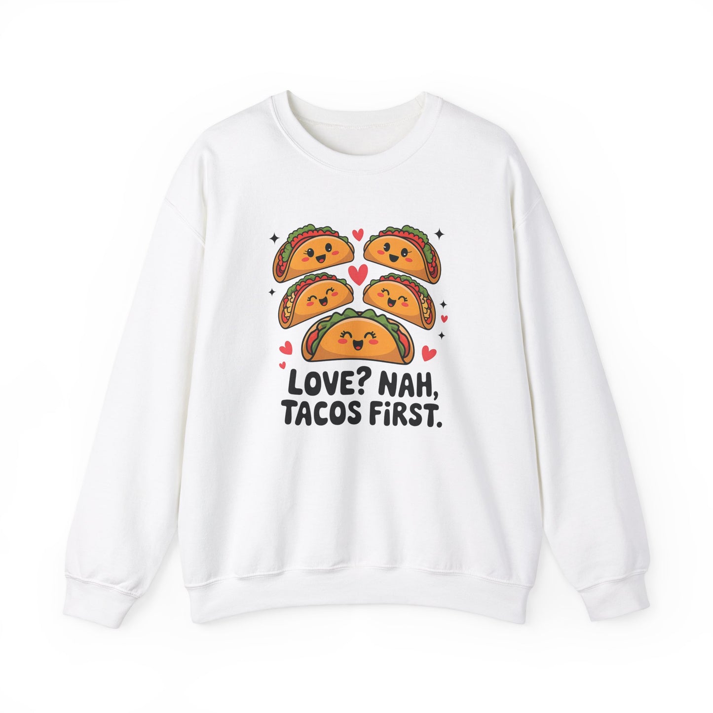 Front view of a white sweatshirt with "Love? Nah. Tacos First." text and cute taco characters design in orange and brown. Exclusive release for Valentine's Day. Part of the Vivid Divergence Sensory Friendly Sweaters Range.