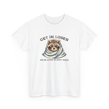 Hanging front view of a white T-shirt featuring a cute raccoon wrapped in a blanket with text that reads "Get In Loser, We're Going Blanky Mode." Part of the Vivid Divergence Sensory Friendly Unisex Tees Range.